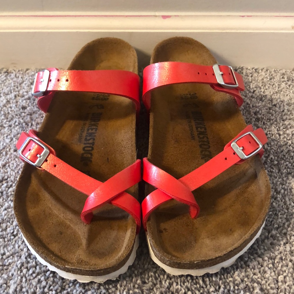 Red sandal Birkenstock’s